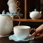 ⁦طقم شاي وجاتوه بورسلين مموج تايلاندي لبني كنار ذهبي 24 قطعة⁩ - الصورة ⁦2⁩