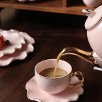 ⁦طقم شاي وجاتوه بورسلين مموج تايلاندي بينك كنار ذهبي 24 قطعة⁩ - الصورة ⁦7⁩